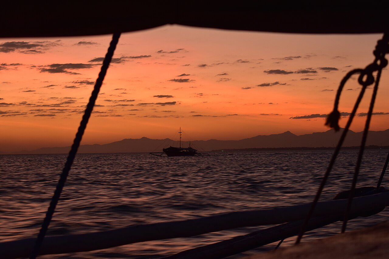Sunset seen from a bangka boat crossing between Guimaras and Iloilo