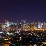 Makati skyline at night, where much of the KTV in Manila is concentrated