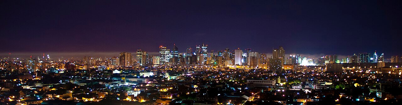 Makati skyline at night, where much of the KTV in Manila is concentrated