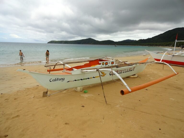 Outrigger boats at a tropical cove