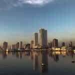 Where to stay in Manila, the city skyline seen across Manila Bay