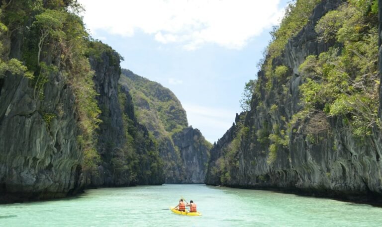 Boat passengers wearing life vests in Palawan, basic safety on island hopping tours