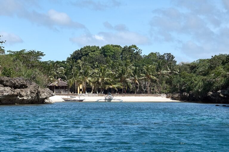 Natago Beach, a secluded cove reachable from Guimaras resort accommodation